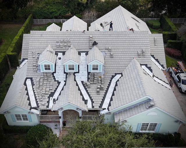 Close-up of tile roof underlayment deterioration on a South Florida home — Mike McGilvary Roofing inspection