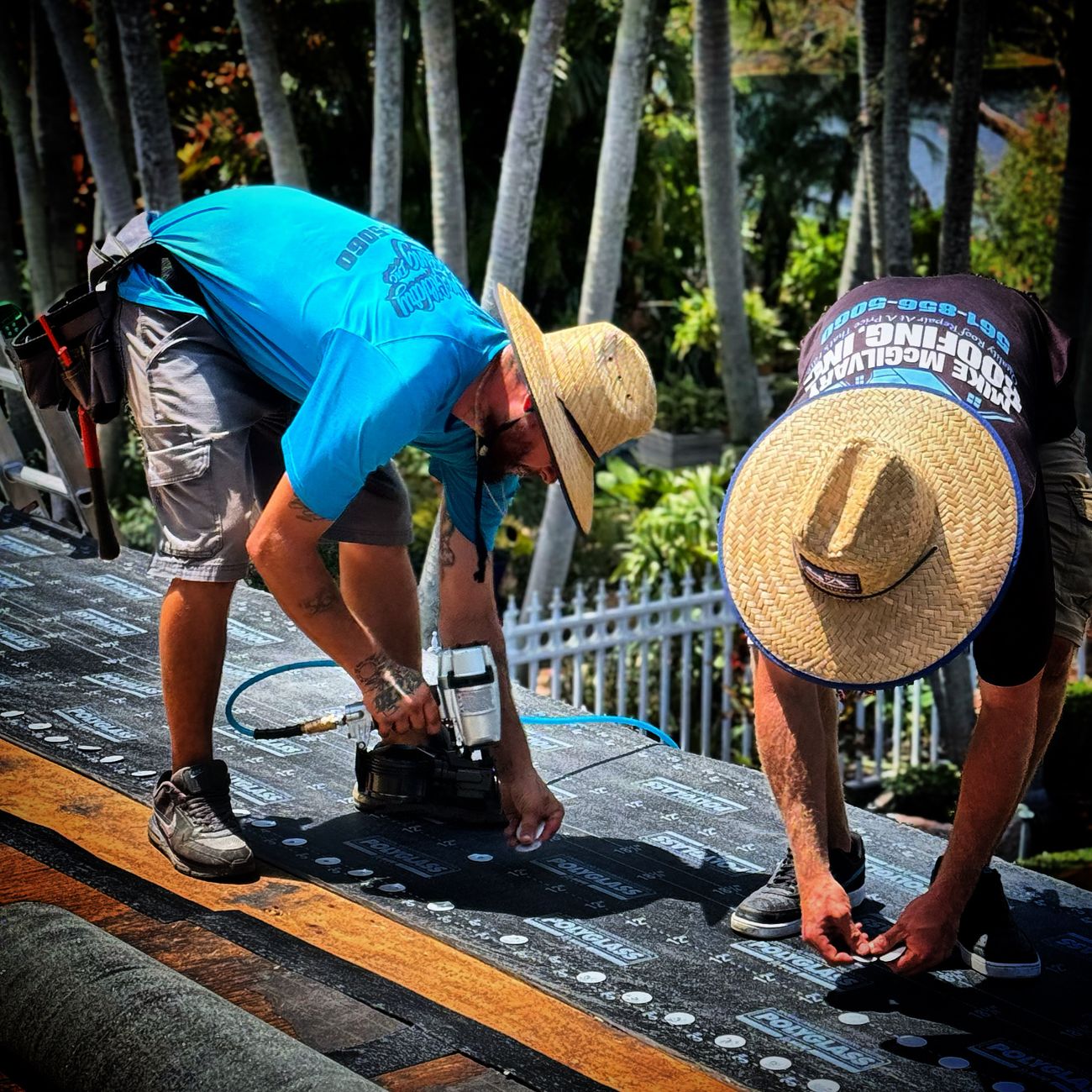 A Mike McGilvary Roofing crew at work