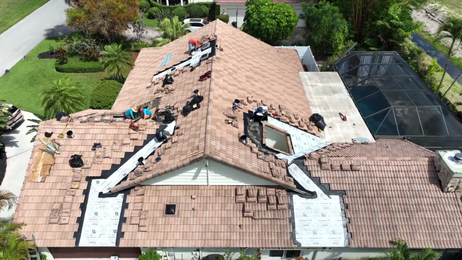 The Mike McGilvary Roofing team on a Palm Beach County rooftop