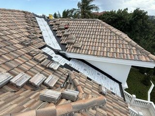 Close inspection of the concrete tile roof documenting condition section by section