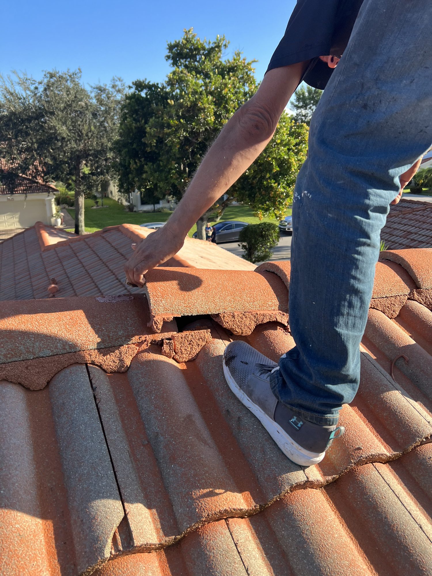Mike McGilvary Roofing inspecting the tile roof at Canoe Shore Way, Delray Beach