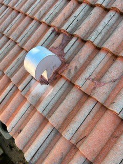 Failed mortar around a roof vent at Canoe Shore Way, Delray Beach