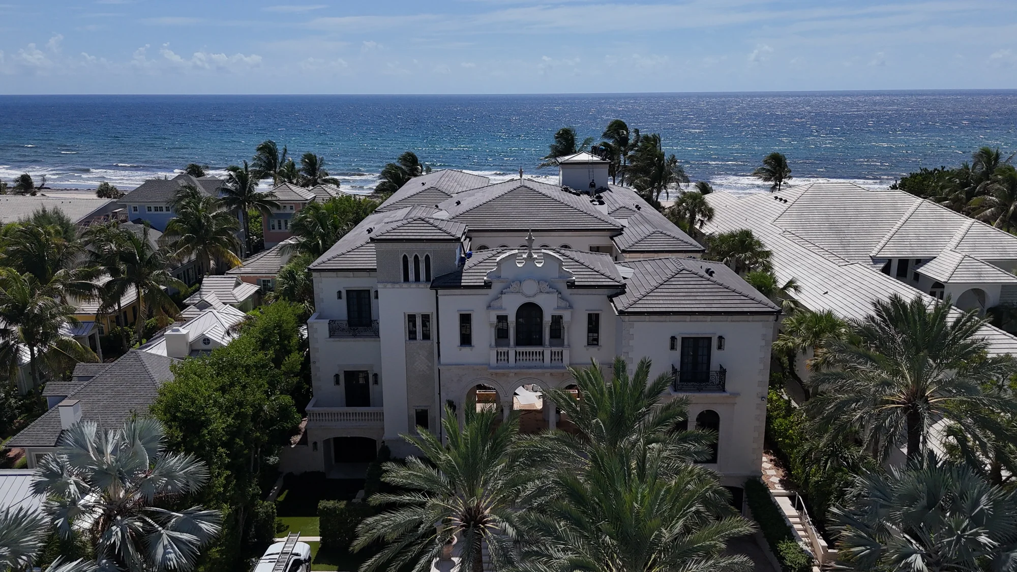 Completed tile roof preservation project on a Delray Beach oceanfront estate overlooking the Atlantic Ocean