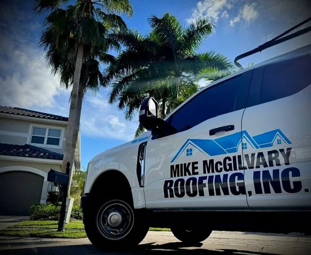 Mike McGilvary Roofing truck at a Florida home — Realty Times home-buyer roof questions feature
