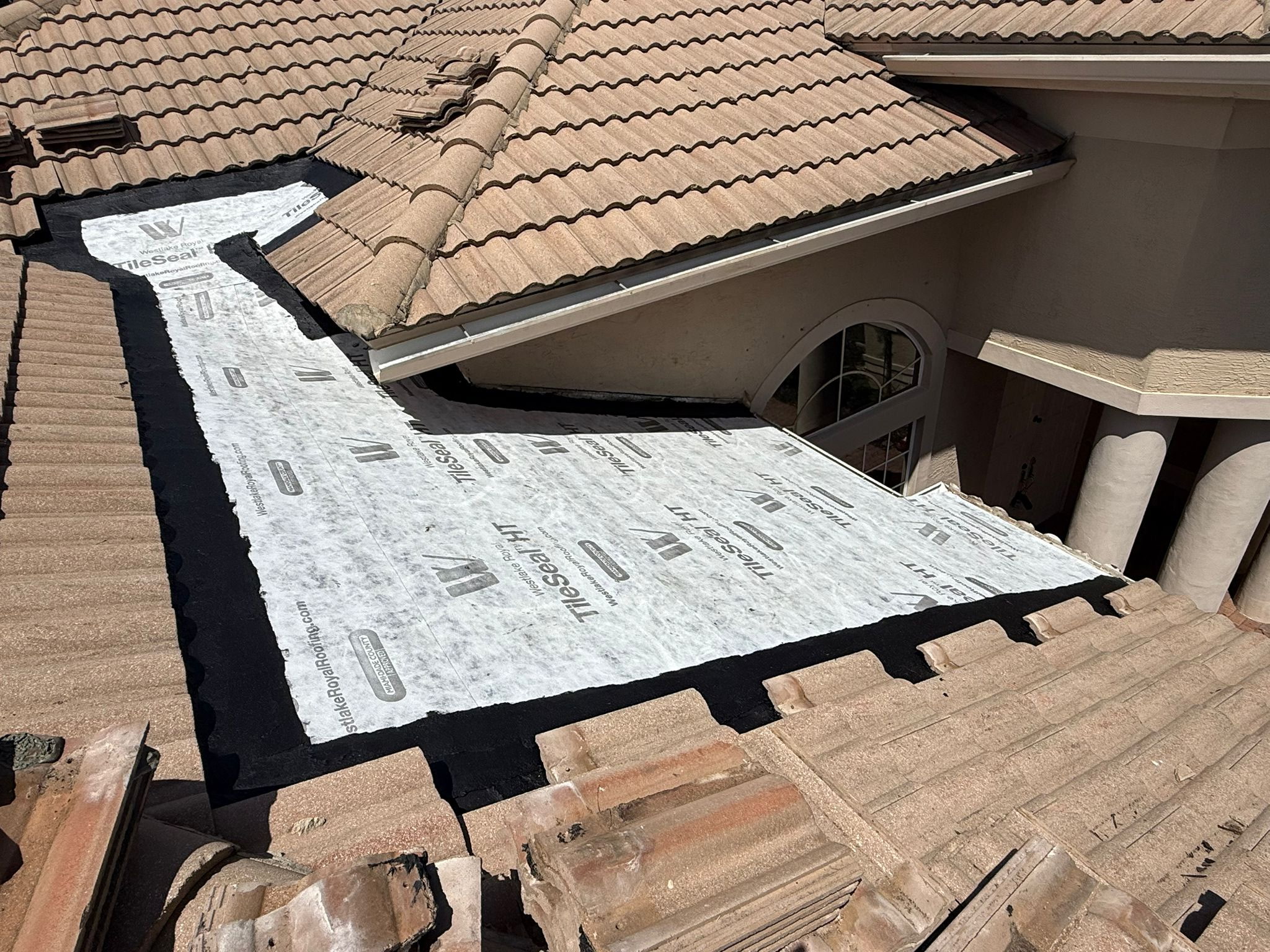 Lake Clarke Shores tile roof section rebuilt with new high-temperature self-adhered underlayment sealed at every edge