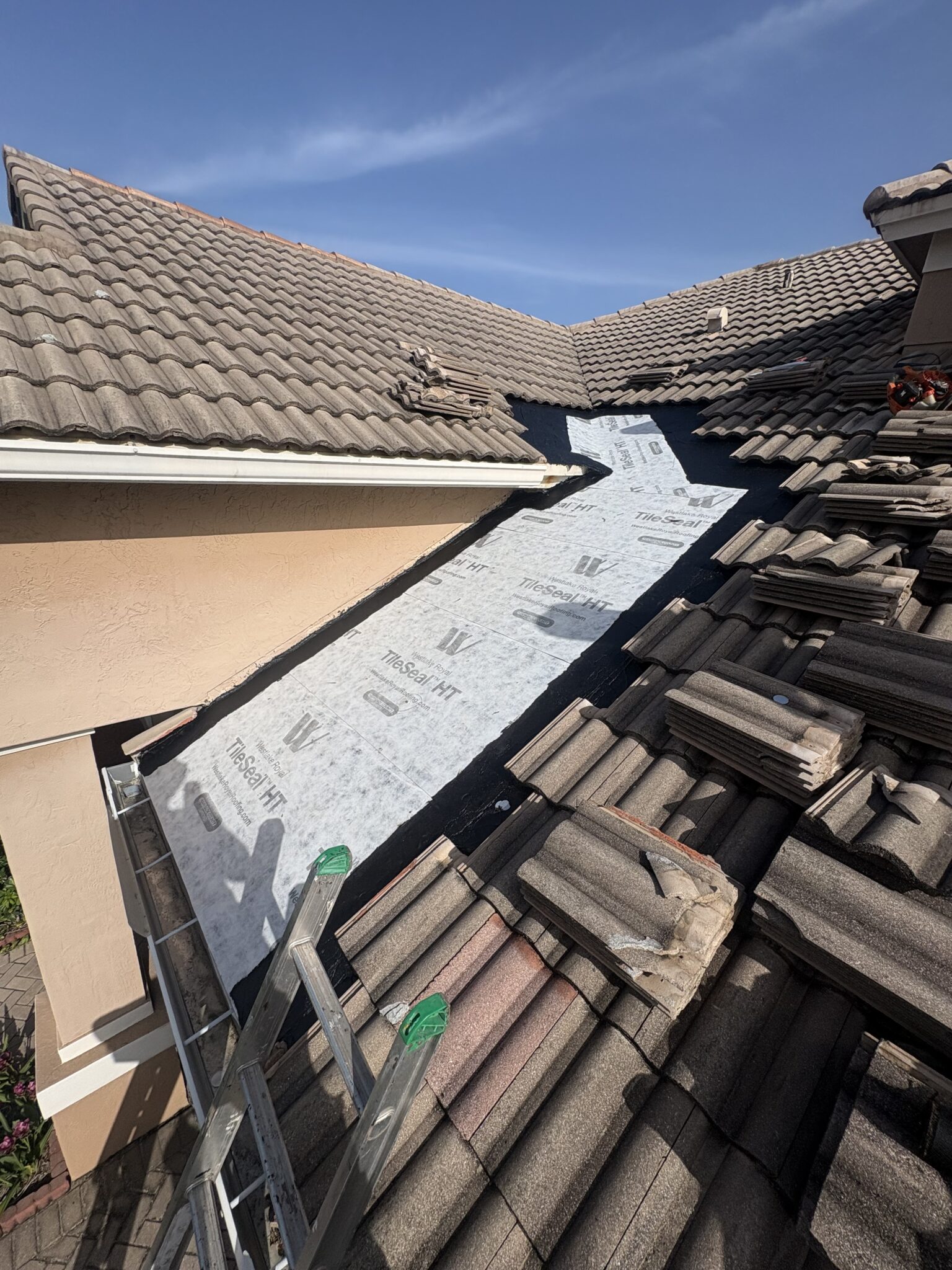 West Boca Raton tile roof section rebuilt with continuous new high-temperature self-adhered underlayment from the lower edge up the slope