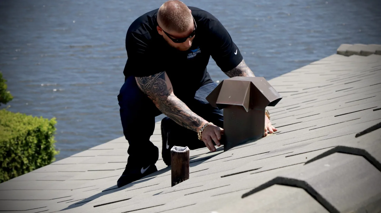 Mike McGilvary evaluating a roof penetration and vent flashing during a tile roof inspection