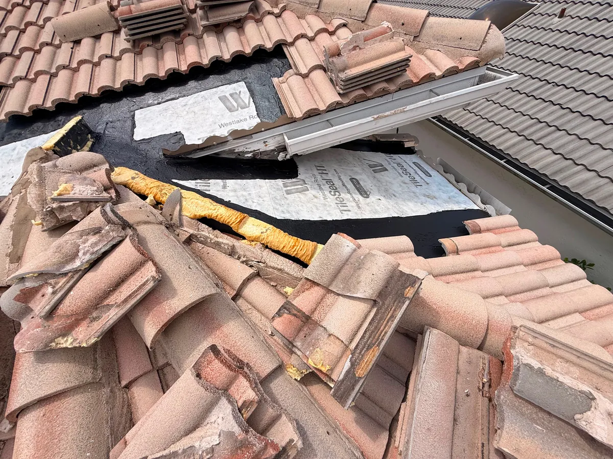 New underlayment installed and original tile being reset