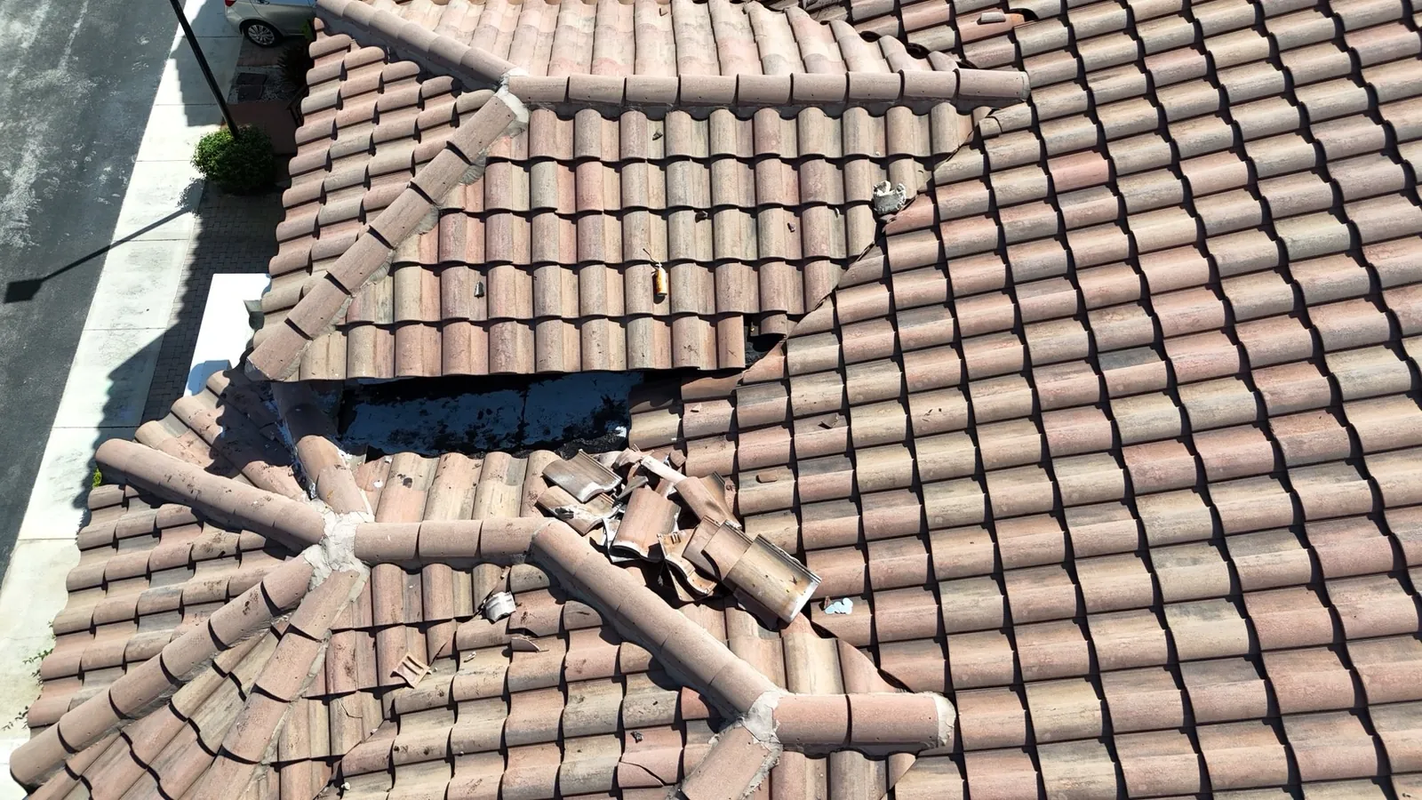 Open junction between two tile roof sections