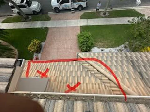 Delray Beach 33445 tile roof with the leak section outlined in red on Mike McGilvary's inspection photo