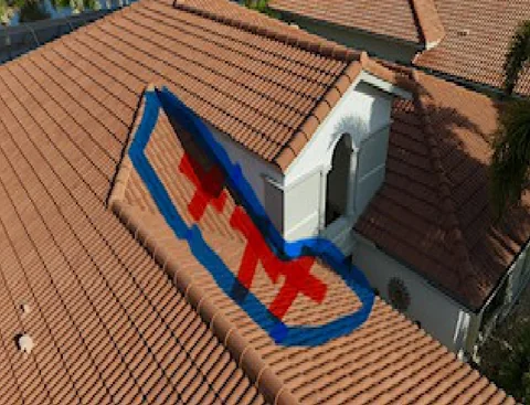 First failing roof section, outlined in blue above the garage leak, Delray Beach 33446