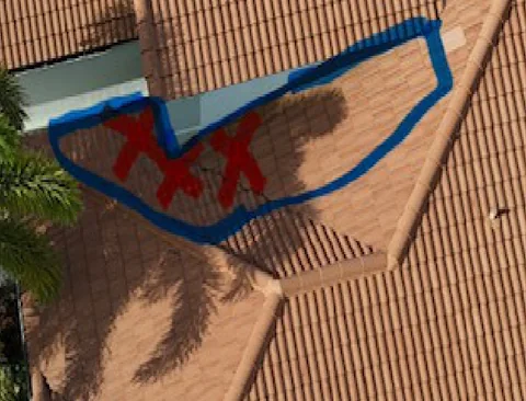 Second failing roof section, outlined in blue above the front entry, Delray Beach 33446