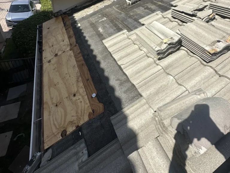 New plywood installed along the gutter where the rotted roof deck was removed.