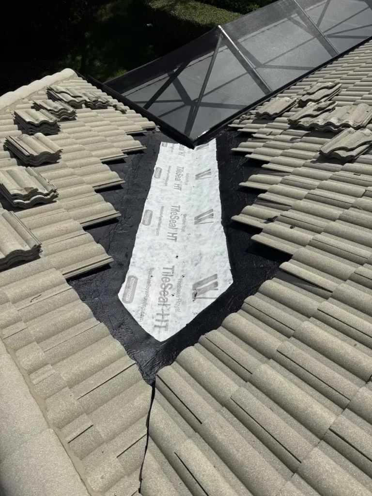 The same valley lined with new self-adhered underlayment before the tiles go back.