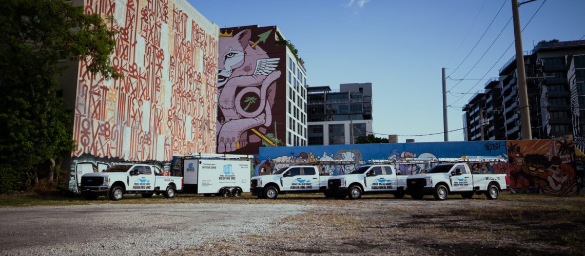 The Mike McGilvary Roofing fleet of service trucks