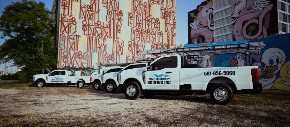Mike McGilvary Roofing service trucks lined up