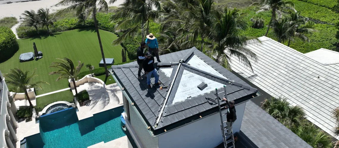 Roofing specialists preserving tile roof on South Florida oceanfront estate