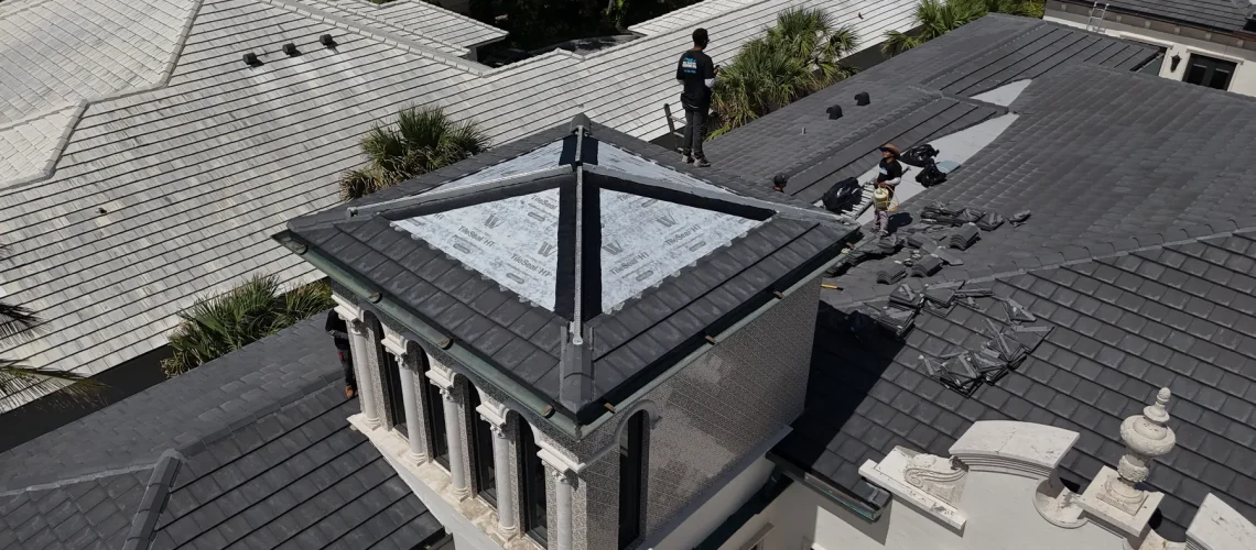 Concrete tiles removed to expose and rebuild roof underlayment section