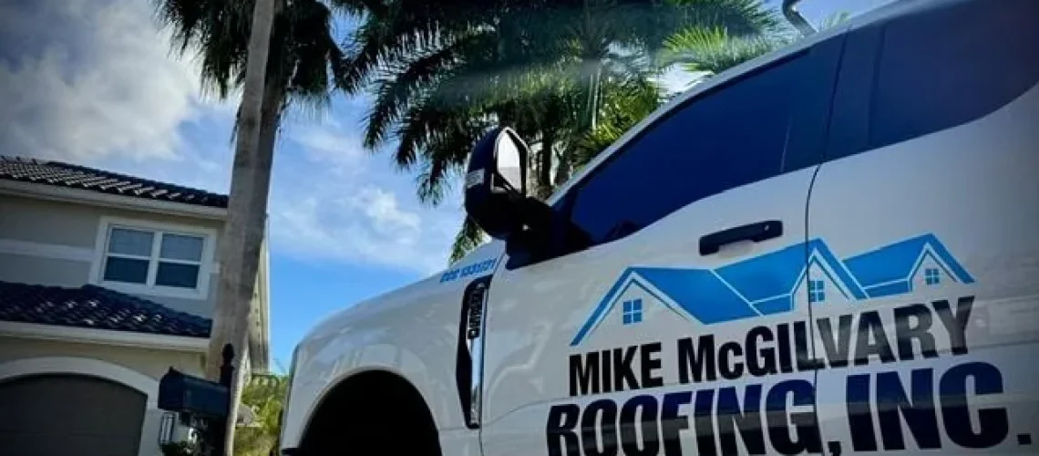 Mike McGilvary Roofing truck at a Florida home — Realty Times home-buyer roof questions feature